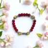 Bracelet en pierre de corail rouge et calcite jaune. Confiance en soi, intuition et détermination.