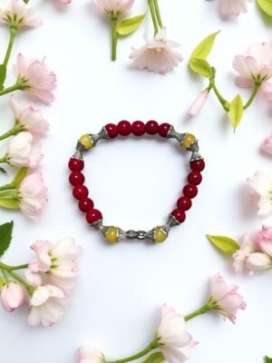 Bracelet en pierre de corail rouge et calcite jaune. Confiance en soi, intuition et détermination.