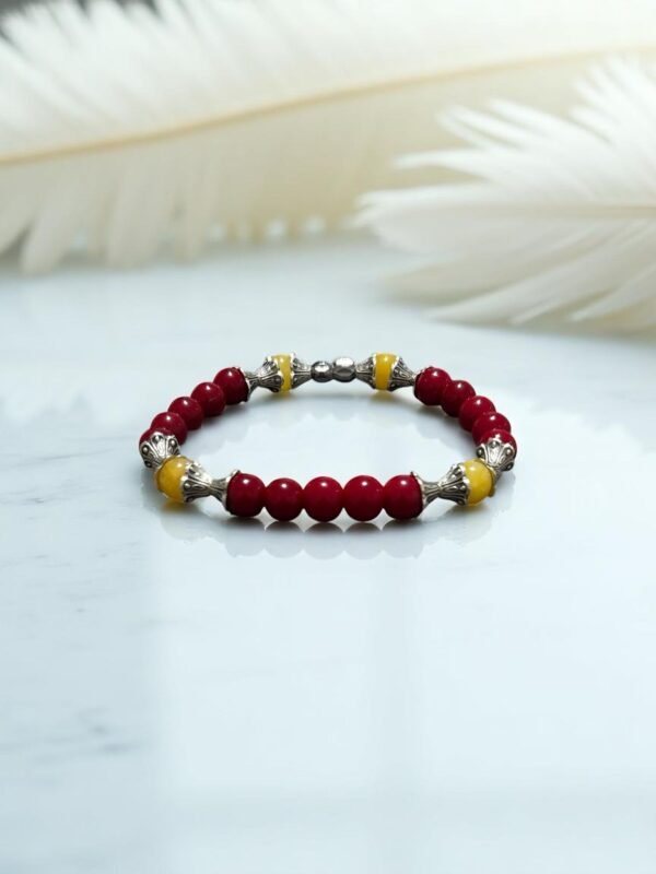 Bracelet en pierre de corail rouge et calcite jaune. Confiance en soi, intuition et détermination.