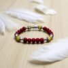 Bracelet en pierre de corail rouge et calcite jaune. Confiance en soi, intuition et détermination.