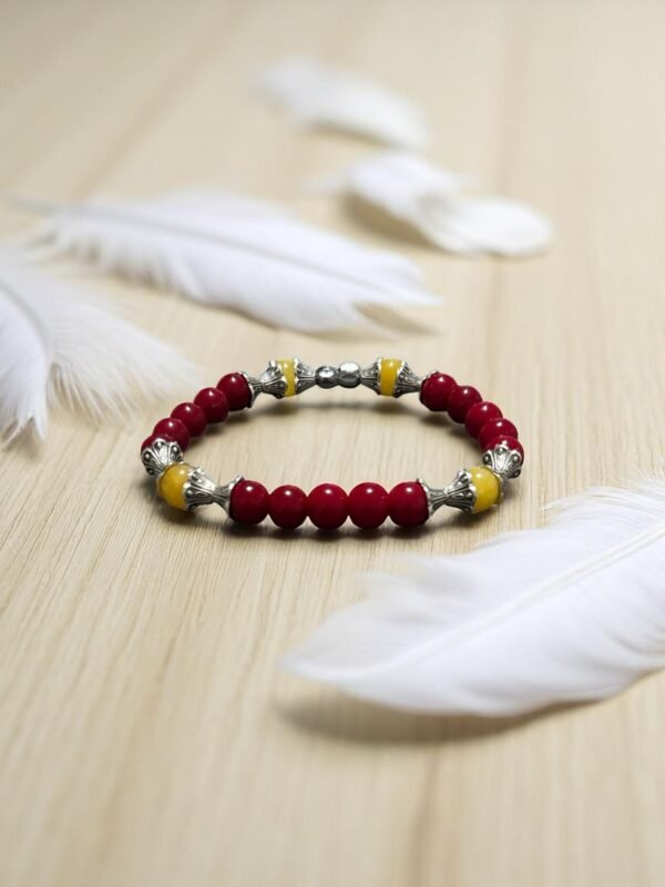 Bracelet en pierre de corail rouge et calcite jaune. Confiance en soi, intuition et détermination.